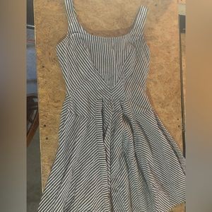 Fitted black and white striped dress.